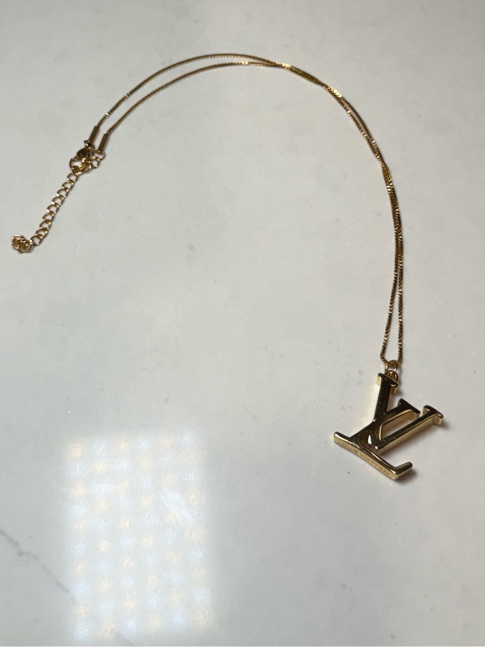 Louis Vuitton Gold Logo Necklace